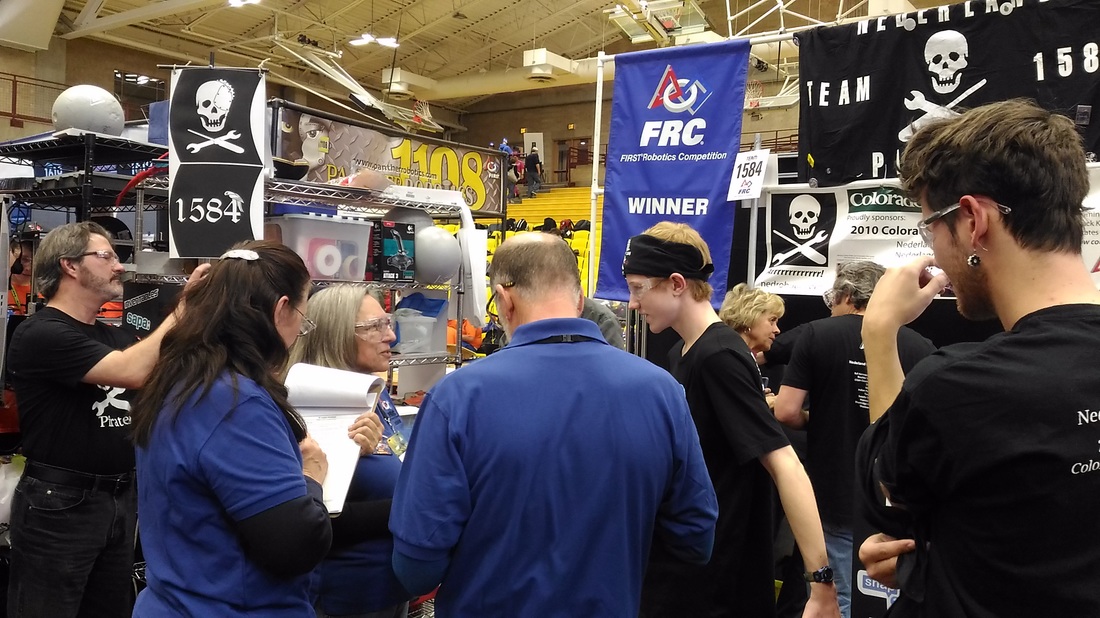 photo: regionals_robo-william-with-judges-2_orig.jpg